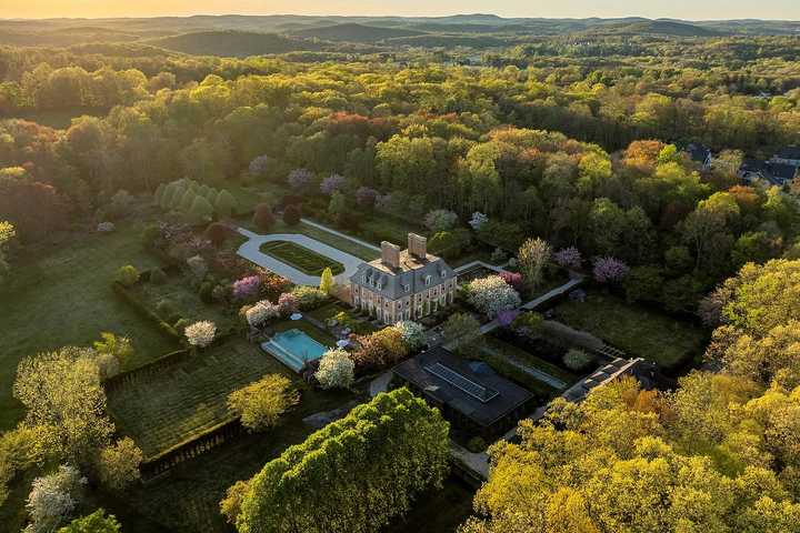 $9.25M Grand Estate With Indoor Pool, Horse Barn, Movie Theater Hits Market In Westchester