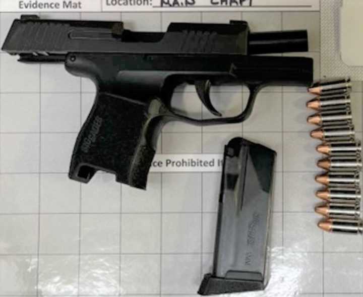 The loaded handgun found in the carry-on, which had 10 bullets, officials said. 